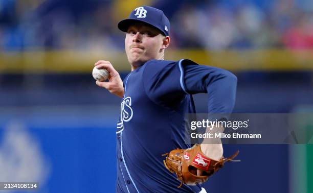 Pete Fairbanks of the Tampa Bay Rays pitches in the ninth inning during a game against the Texas Rangers at Tropicana Field on April 02, 2024 in St...