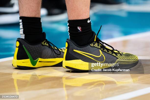 The shoes of Payton Pritchard of the Boston Celtics during their game against the Charlotte Hornets at Spectrum Center on April 01, 2024 in...