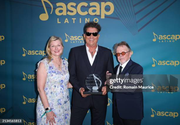 Elizabeth Matthews and ASCAP President and Chairman, Paul Williams present Carlos Vives with the ASCAP Founders Award at the 2024 ASCAP Latin Music...