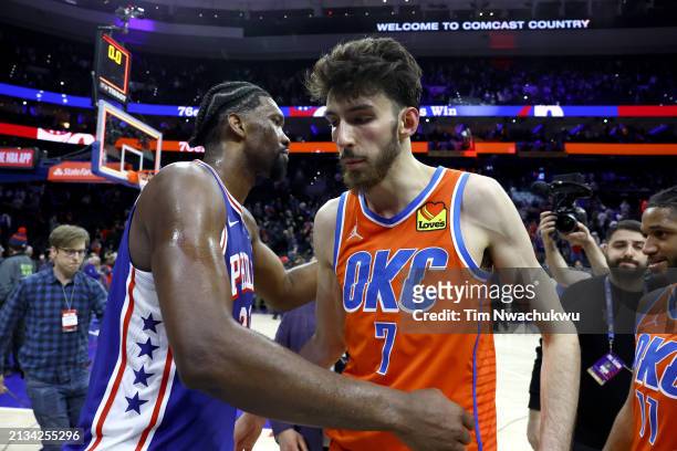 Joel Embiid of the Philadelphia 76ers and Chet Holmgren of the Oklahoma City Thunder greet following a game at the Wells Fargo Center on April 02,...