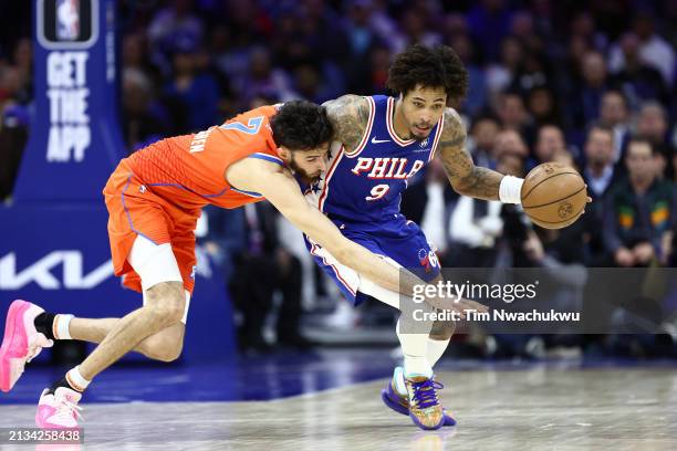 Kelly Oubre Jr. #9 of the Philadelphia 76ers steals the ball from Chet Holmgren of the Oklahoma City Thunder during the fourth quarter at the Wells...