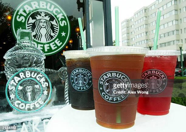 Starbucks' new iced coffee and tea beverages are displayed during a promotion June 2, 2003 outside a Starbucks coffee shop at Dupont Circle in...