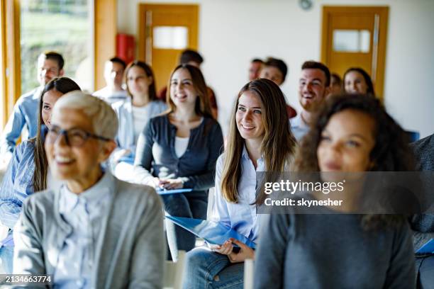 happy business people having a seminar in board room. - entrepreneur stockfoto's en -beelden