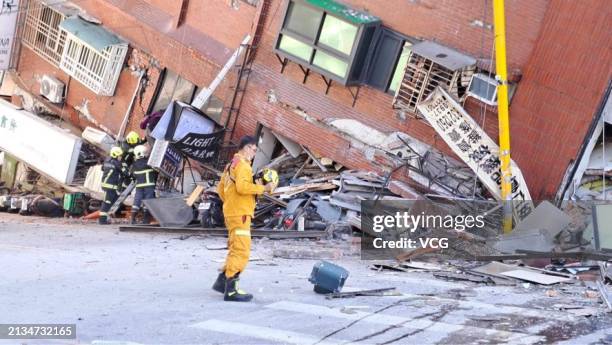 Rescuers work at the partially collapsed building after a powerful 7.3-magnitude earthquake rocked the entire island on April 3, 2024 in Hualien...