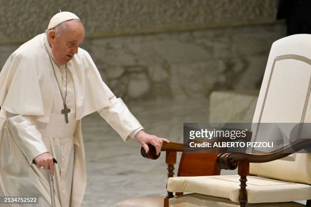 Pope Francis arrives for an audience to Italian Red Cross Volunteers on April 6, 2024 at Paul-VI hall in The Vatican.