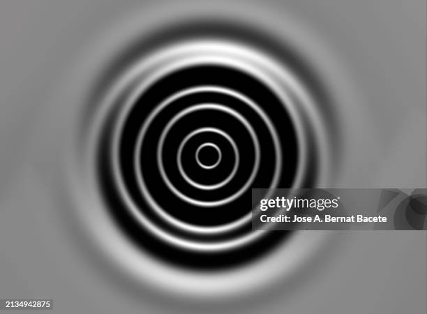 concentric circles in relief by the waves produced by a drop of water. - onde sinusoïdale photos et images de collection