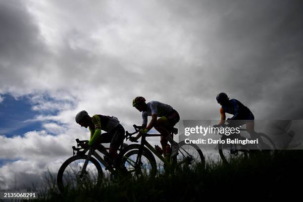 Kristian Sbaragli of Italy and Team Corratec - Vini Fantini, Joes Oosterlinck of Belgium and Team Bingoal WB - White best young jersey and Matisse...