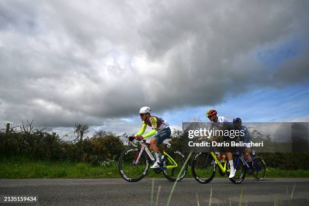 Kristian Sbaragli of Italy and Team Corratec - Vini Fantini, Joes Oosterlinck of Belgium and Team Bingoal WB - White best young jersey and Matisse...