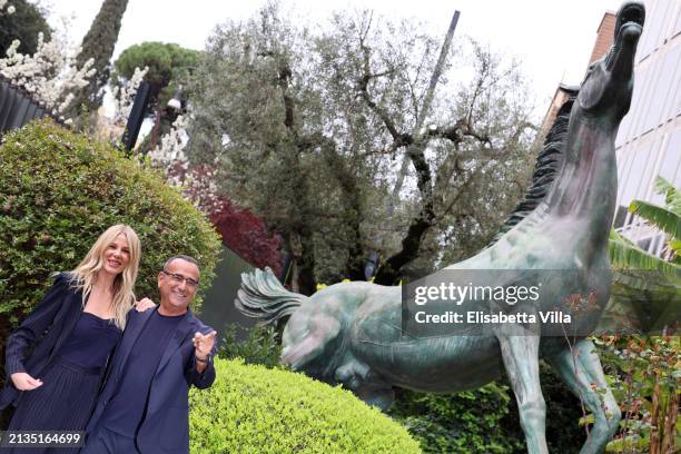 Alessia Marcuzzi and Carlo Conti attend a photocall for the "69th David di Donatello" press conference at RAI Viale Mazzini on April 03, 2024 in...