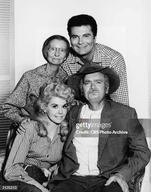 Promotional portrait of the cast of the television series, 'The Beverly Hillbillies,' c. 1965. Clockwise from top: American actors Max Baer Jr. As...