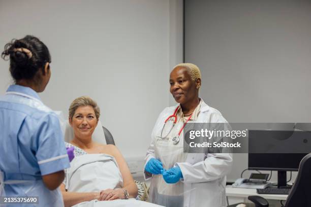 appointment with observation - biopsy stock pictures, royalty-free photos & images