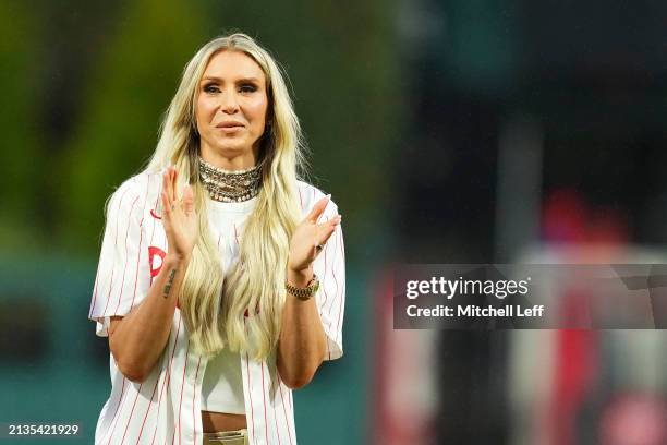 Wrestler Charlotte Flair reacts prior to the game between the Cincinnati Reds and Philadelphia Phillies at Citizens Bank Park on April 2, 2024 in...