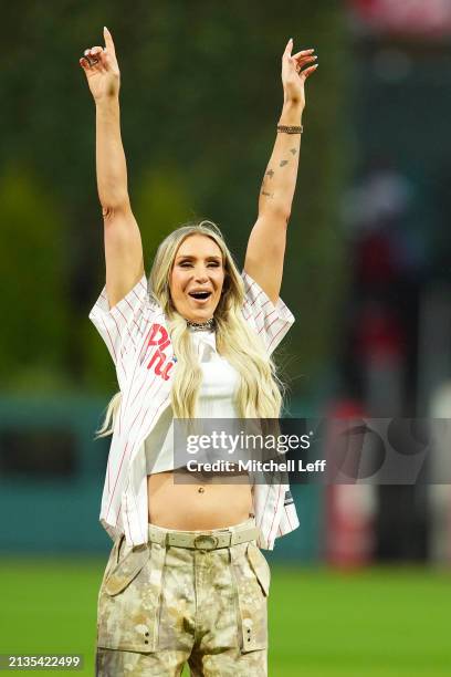 Wrestler Charlotte Flair reacts prior to the game between the Cincinnati Reds and Philadelphia Phillies at Citizens Bank Park on April 2, 2024 in...