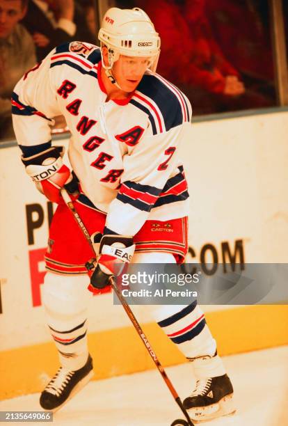 Defenseman Brian Leetch of the New York Rangers handles the puck in the game between the Buffalo Sabres vs the New York Rangers at Madison Square...