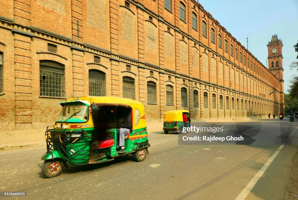 Indian Tuktuk front of Kanpur cotton mill