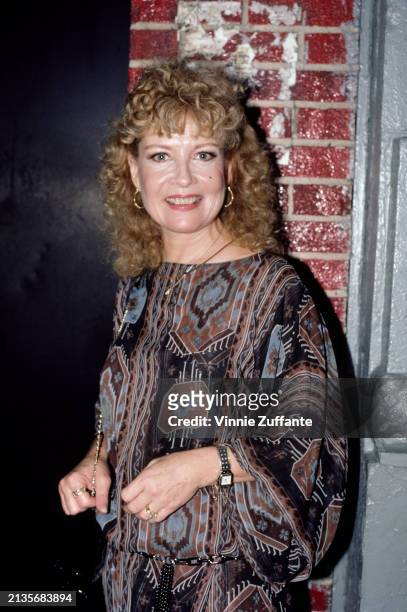 American actress and singer Gloria DeHaven, wearing a brown-and-blue patterned outfit, United States, circa 1985.