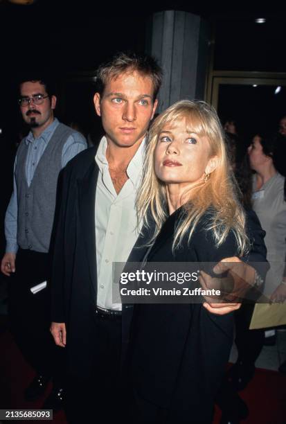 American sportscaster and actor Patrick O'Neal and American actress Rebecca De Mornay attend the Westwood premiere of 'Desperado', at Mann's National...