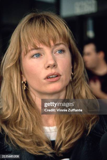 American actress Rebecca De Mornay attends the Hollywood premiere of 'The Three Musketeers' held at the Pacific Cinerama Dome Theater in Los Angeles,...