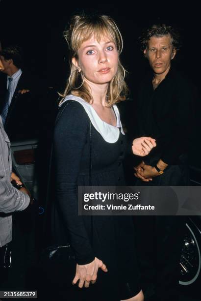 American actress Rebecca De Mornay, wearing a black outfit with a white collar, attends the Universal City premiere of 'Wild At Heart', at the...