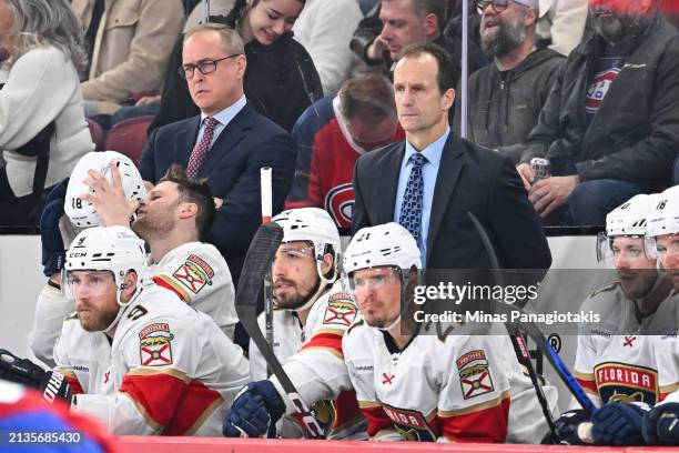 Head coach of the Florida Panthers Paul Maurice and assistant coach Jamie Kompon, handle the bench during the third period against the Montreal...