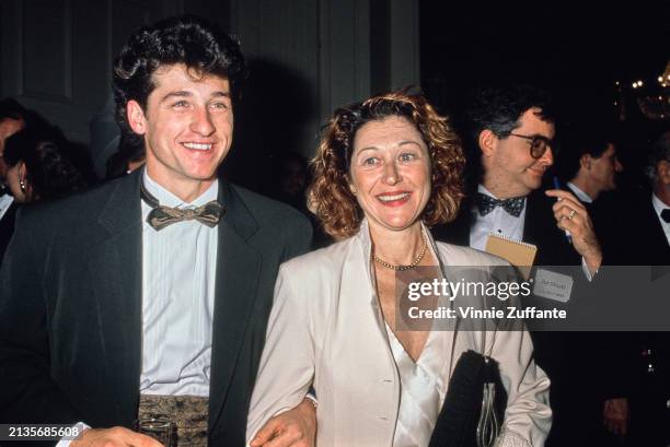 American actor Patrick Dempsey, wearing a tuxedo with a brown bow tie and matching cummerbund, and his wife, American actress Rochelle 'Rocky'...