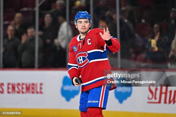 Nick Suzuki of the Montreal Canadiens skates onto the ice after a 5-3 victory against the Florida Panthers at the Bell Centre on April 2, 2024 in...