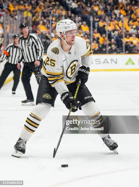 Brandon Carlo of the Boston Bruins skates against the Nashville Predators during an NHL game at Bridgestone Arena on April 2, 2024 in Nashville,...