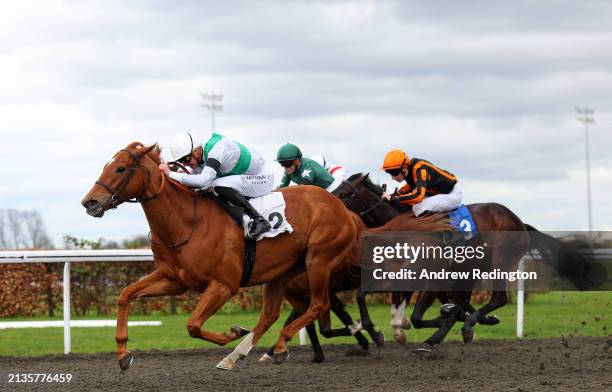 James Doyle riding Mighty Nebula to victory in the Unibet More Boosts In More Races Maiden Stakes at Kempton Park on April 03, 2024 in Sunbury,...