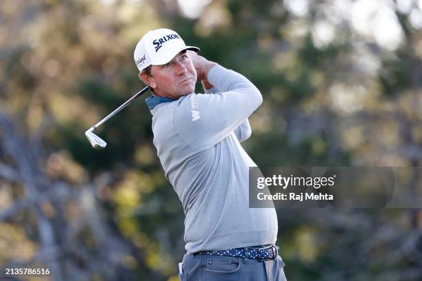 Lucas Glover of the United States plays his shot from the 13th teeduring a practice round prior to the Valero Texas Open at TPC San Antonio on April...