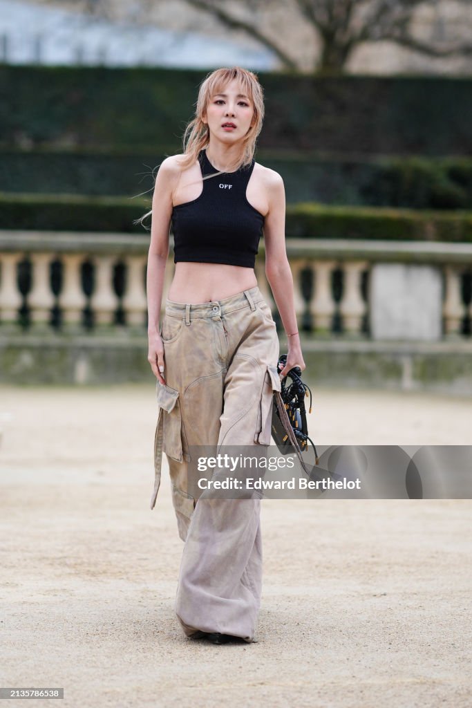 Street Style - Paris Fashion Week - Womenswear Fall/Winter 2024/2025 - Day Four