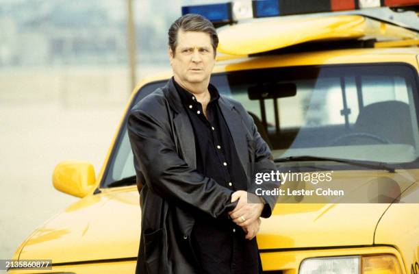 American musician Brian Wilson, of the American rock band The Beach Boys, at a beach in Los Angeles, during a shoot for an appearance by the band in...