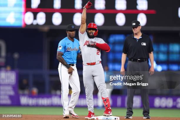 Luis Rengifo of the Los Angeles Angels reacts after hitting a double against the Miami Marlins during the first inning at loanDepot park on April 03,...