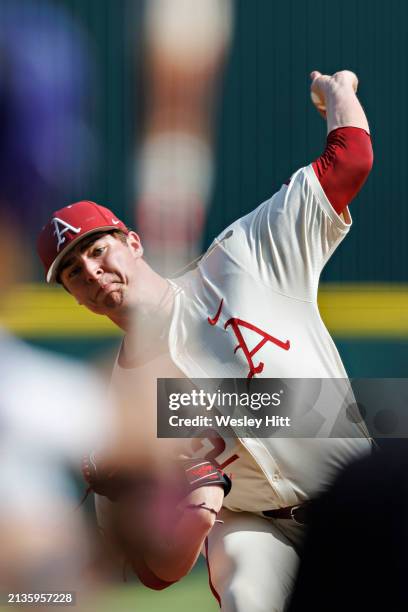 Hunter Dietz of the Arkansas Razorbacks throws a pitch during the game against the LSU Tigers at Baum-Walker Stadium at George Cole Field on March...