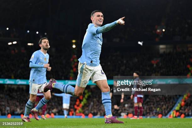 Phil Foden of Manchester City celebrates scoring his team's third goal during the Premier League match between Manchester City and Aston Villa at...