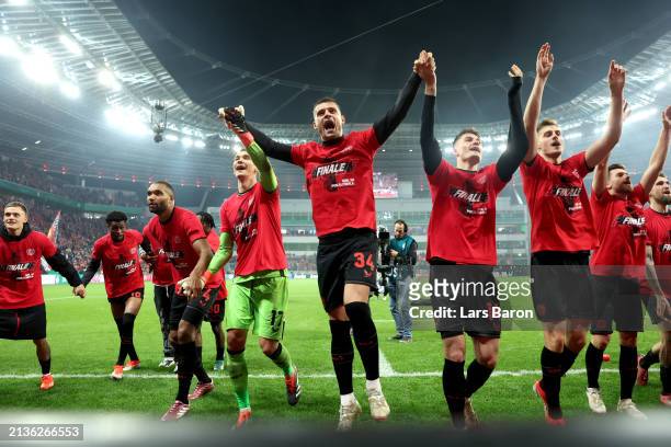 Granit Xhaka of Bayer Leverkusen and teammates celebrate victory following the DFB cup semifinal match between Bayer 04 Leverkusen and Fortuna...