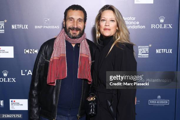 Zinedine Soualem and Caroline Faindt attend the "L'Art De James Cameron - The Art Of James Cameron" Exhibition At La Cinematheque on April 03, 2024...