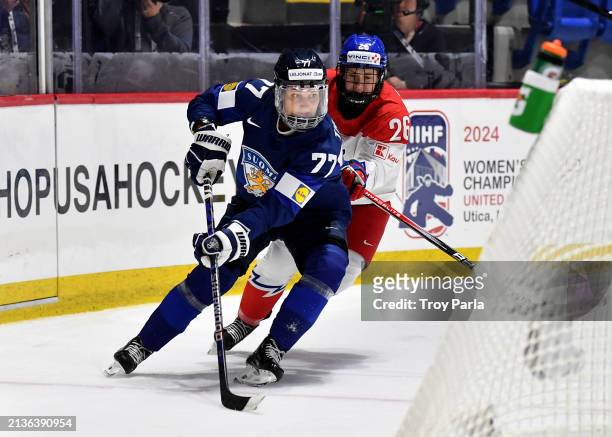 Susanna Tapani of Finland shields the puck from Vendula Pribylova of Czechia in second period during the 2024 IIHF Women's World Championship at...