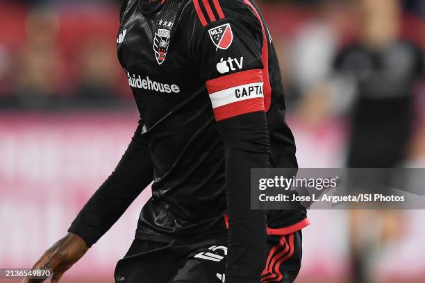 Christian Benteke of D.C. United captain arm band during a game between CF Montreal and D.C. United at Audi Field on March 30, 2024 in Washington, DC.