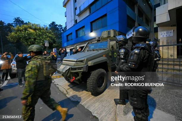 Military and police guard the Flagrancy Unit of the Public Prosecutor's Office, where former Ecuadorian vice president Jorge Glas was transferred...