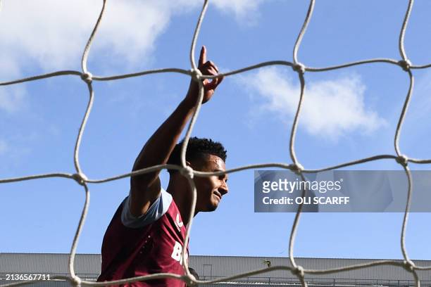 Aston Villa's English striker Ollie Watkins celebrates after scoring his team first goal during the English Premier League football match between...