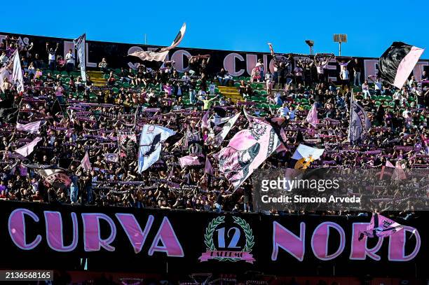Palermo's fans wave their flags prior to kick-off in the Serie B match between Palermo and UC Sampdoria at Stadio Renzo Barbera on April 6, 2024 in...