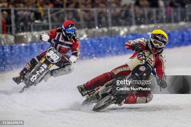 Martin Posch of Austria, in yellow, is leading Jo Saetre of Norway, in red, during the Roelof Thijs Bokaal at Ice Rink Thialf in Heerenveen, The...
