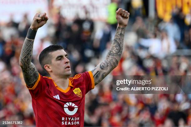 Roma's Italian defender Gianluca Mancini celebrates after scoring the team's first goal during the Italian Serie A football match between AS Roma and...
