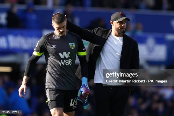 Burnley manager Vincent Kompany with goalkeeper Arijanet Muric after the final whistle in the Premier League match at Goodison Park, Liverpool....