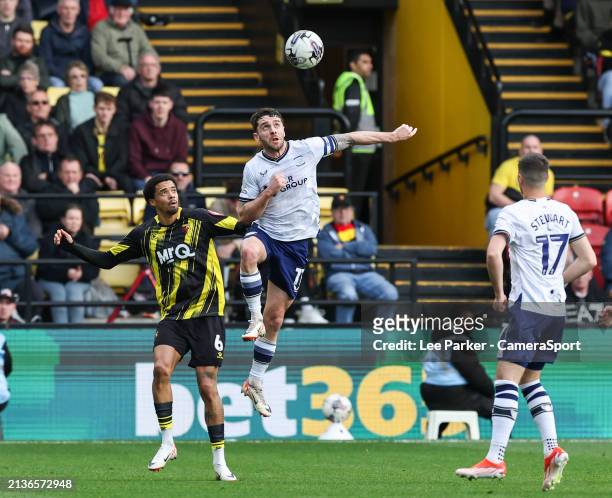 Preston North End's Robbie Brady heads the ball under pressure from Watford's Jamal Lewis during the Sky Bet Championship match between Watford and...