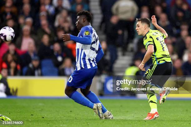 Leandro Trossard of Arsenal scoring the third goa during the Premier League match between Brighton & Hove Albion and Arsenal FC at American Express...