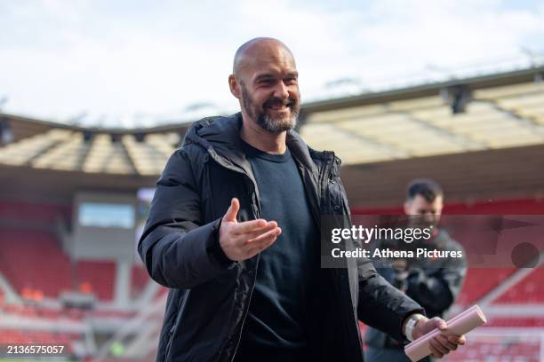 Luke Williams Manager of Swansea City inspects the page during the Sky Bet Championship match between Middlesbrough and Swansea City at the Riverside...