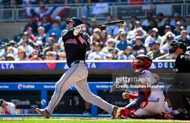 David Fry of the Cleveland Guardians hits a home run in the second inning of the game against the Minnesota Twins at Target Field on April 6, 2024 in...