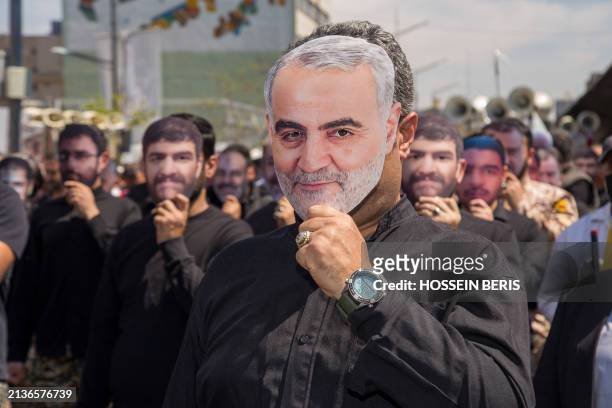 Iranians attend the annual Quds Day commemorations and the funeral of seven Revolutionary Guard Corps members killed in a strike on the country's...