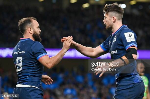 Dublin , Ireland - 6 April 2024; Jamison Gibson-Park of Leinster, left, celebrates with teammate Ross Byrne after scoring their side's second try...